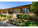 Charming single-story home with a walkway, verdant lawn, and security door at 2514 N 22Nd Ave, Phoenix, AZ 85009