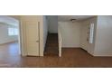 Inviting entryway featuring tile floors and staircase at 2847 S 161St Dr, Goodyear, AZ 85338