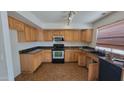 Kitchen with ample counter space and modern appliances at 2847 S 161St Dr, Goodyear, AZ 85338