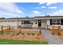 Inviting home exterior featuring a cozy front patio with modern seating at 4018 E Coolidge St, Phoenix, AZ 85018