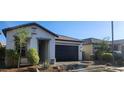 Charming single-story home featuring a well-manicured landscape and a convenient two-car garage at 6621 E Villa Rita Dr, Phoenix, AZ 85054