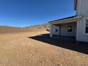 Large backyard features mountain views and a blank canvas for landscaping at 10043 S 23Rd Dr, Phoenix, AZ 85041