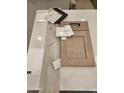 Selection of tiles, countertops, and flooring options for a customized home design at 1145 E Gleneagle Dr, Chandler, AZ 85249