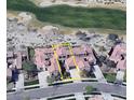 Stunning aerial view of the property with a beautiful backyard, neighboring golf course, and community at 3554 N Hooper St, Buckeye, AZ 85396