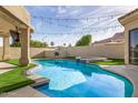 Backyard pool featuring an attached hot tub, a deck, and a tanning ledge at 7439 E Beryl Ave, Scottsdale, AZ 85258