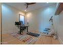Bright office with modern desk setup, fitness equipment, and natural light at 8214 N 16Th St, Phoenix, AZ 85020