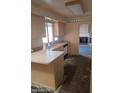 View of a kitchen area with cabinets and appliances at 1128 E Malibu E Dr, Tempe, AZ 85282