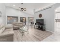 Open-concept living room featuring modern furniture and abundant natural light at 19651 N 34Th St, Phoenix, AZ 85050