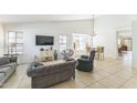 Inviting living room with large windows, comfortable seating, and neutral decor at 5263 E Hannibal St, Mesa, AZ 85205