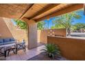 Charming outdoor patio with comfortable seating and desert landscaping for relaxation at 8414 N Central Ave # C, Phoenix, AZ 85020