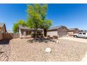Charming single-story home features low-maintenance landscaping and attached two car garage at 1376 E Rosemary Trl, Casa Grande, AZ 85122