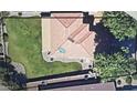 Aerial view of property showing backyard and roof, along with the address and price at 14922 N 172Nd Dr, Surprise, AZ 85388