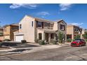 Inviting two-story home with desert landscaping, two-car garage, and classic tile roof at 2862 E Megan St, Gilbert, AZ 85295