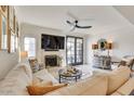 Cozy living room featuring a fireplace, comfortable sofa, and stylish decor at 6131 N 28Th Pl, Phoenix, AZ 85016