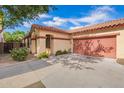 Charming single-story home with attached garage and a well-maintained yard at 6359 S Forest Ave, Gilbert, AZ 85298