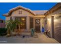 Charming single-story home with desert landscaping, a welcoming entrance, and a well-maintained facade at 6939 S Red Hills Rd, Gold Canyon, AZ 85118