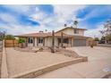 Charming two-story home featuring a two-car garage, and low-maintenance landscaping at 9803 N 40Th Dr, Phoenix, AZ 85051