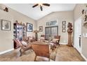 Elegant living room with vaulted ceilings, stylish decor, and neutral color palette at 15226 N 51St St, Scottsdale, AZ 85254