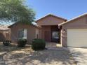 Attractive single-level home with desert landscaping and a well-maintained front yard at 1930 W Burgess Ln, Phoenix, AZ 85041