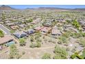 Expansive aerial view of the property highlighting the private pool and lush desert surroundings at 30374 N 124Th Dr, Peoria, AZ 85383
