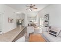 Bright living room featuring neutral tones, stylish decor, and an open-concept design at 725 S Canfield --, Mesa, AZ 85208