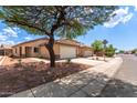 Inviting single-Gathering home with a well-maintained front yard, desert landscaping, and a two-car garage at 11139 W Devonshire Ave, Phoenix, AZ 85037