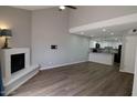 Spacious living room with fireplace and seamless access to the updated kitchen at 2144 E Center Ln # 3, Tempe, AZ 85281