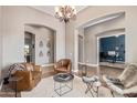 Open concept living room featuring contemporary decor and ample natural light at 2255 N Hillridge --, Mesa, AZ 85207
