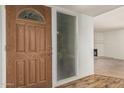Inviting front door featuring decorative glass accents at 5420 N Granite Reef Rd, Scottsdale, AZ 85250