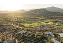 Stunning aerial view of the golf course community, highlighting the lush greenery and beautiful homes at 9894 E Miramonte Dr, Scottsdale, AZ 85262