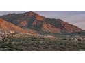 Desert community nestled among mountains with stunning views of the surrounding landscape at 10772 E Canyon Cross Way, Scottsdale, AZ 85255