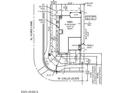 Detailed plot plan showing the layout of the property, including the home, driveway, and setbacks at 14381 W Calle Lejos --, Surprise, AZ 85387