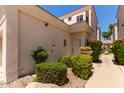 Exterior of a home with well-maintained landscaping and an entrance at 8270 N Hayden Rd # 2041, Scottsdale, AZ 85258