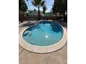 Inviting kidney-shaped pool with built-in steps for easy access at 3933 E Flower St, Phoenix, AZ 85018