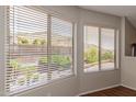 Bright windows overlooking the backyard area and providing natural light at 408 E Silverwood Dr, Phoenix, AZ 85048
