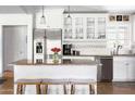 Bright kitchen features white cabinets, granite countertops, and stainless steel appliances at 5808 N 18Th Pl, Phoenix, AZ 85016