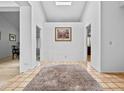Welcoming foyer with tile flooring, a decorative rug, and neutral wall colors at 9637 E Gold Dust Ave, Scottsdale, AZ 85258