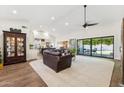 Spacious living area featuring a modern design, open floor plan, and seamless indoor-outdoor transition at 9801 W Rockwood Dr, Peoria, AZ 85382