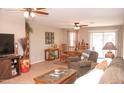 Inviting living room with comfortable seating and natural light with dining area at 2101 S Meridian Rd # 176, Apache Junction, AZ 85120