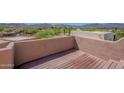 Spacious rooftop deck with wood flooring, perfect for enjoying scenic views and outdoor living at 38065 N Cave Creek Rd # 52, Cave Creek, AZ 85331