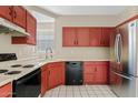 Functional kitchen with essential appliances and ample storage space at 917 E Lexington Ave, Gilbert, AZ 85234
