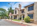 Charming two-story home featuring a tile roof, stucco walls, and well-manicured landscaping at 921 W University Dr # 1191, Mesa, AZ 85201