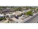 An aerial view of a desert home with a red pickup truck parked in the front of the house at 1285 E Mcmurray Blvd, Casa Grande, AZ 85122