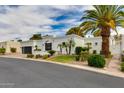 Contemporary single-story home featuring lush landscaping and a welcoming facade at 2737 E Arizona Biltmore Cir # 8, Phoenix, AZ 85016