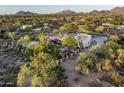 Expansive desert property featuring mature landscaping with mountain views at 22022 N Calle Royale Dr, Scottsdale, AZ 85255