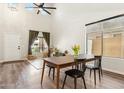 Inviting dining room with ample natural light, neutral walls, and wood flooring, offering a warm atmosphere at 4759 E Woburn Ln, Cave Creek, AZ 85331