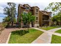A charming two-story home with inviting walkway and meticulously landscaped front yard at 5612 S 21St Pl, Phoenix, AZ 85040