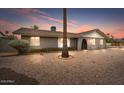 Charming single-story home with desert landscaping and inviting curb appeal at 1036 S 75Th St, Mesa, AZ 85208