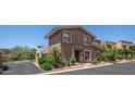 Exterior showcasing the property's architectural style, complemented by established landscaping at 10420 N 10Th St # 2, Phoenix, AZ 85020