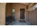 Inviting entryway featuring decorative stone, a bench, and a charming welcome mat at 10420 N 10Th St # 2, Phoenix, AZ 85020